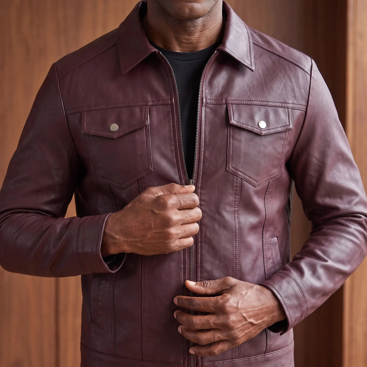 Man zipping up the slim rider jacket