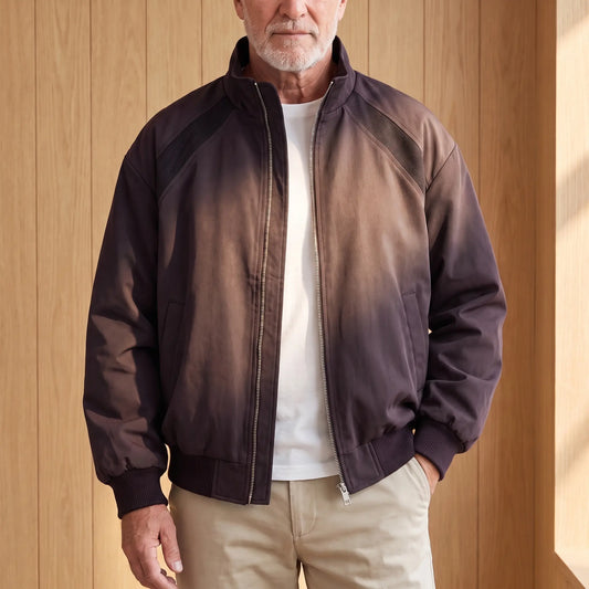 Man wearing the CLASSIC ZIP BOMBER in purple, oversized stand collar zip bomber jacket with washed finish, over a white tee