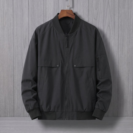 Black bomber jacket on a wooden hanger