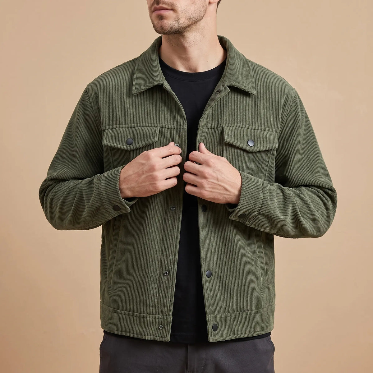 Corduroy chore jacket worn, hands in the lower pockets
