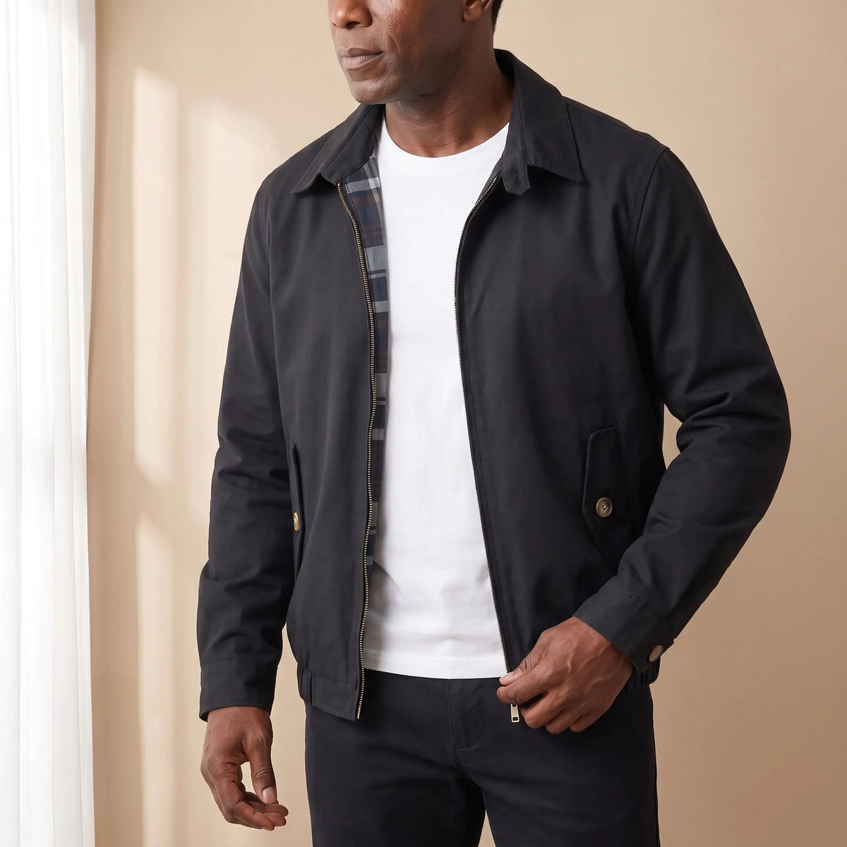 Flap Pocket Harrington in Black, worn open over a white tee