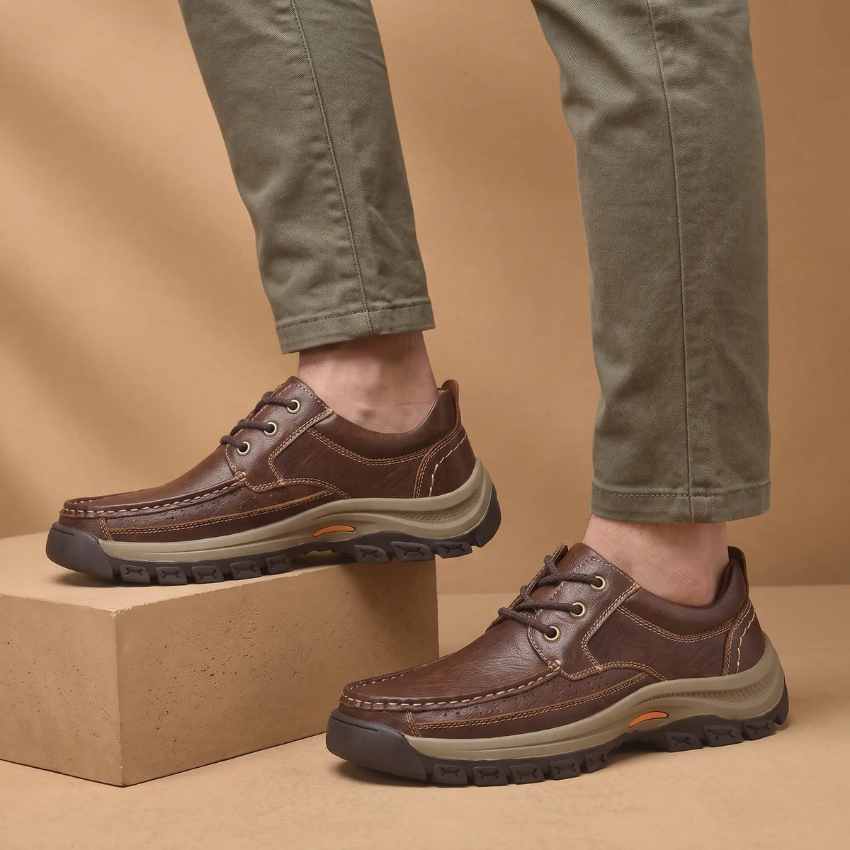 Lug Sole Moc Shoes in Brown worn as a pair with olive chinos