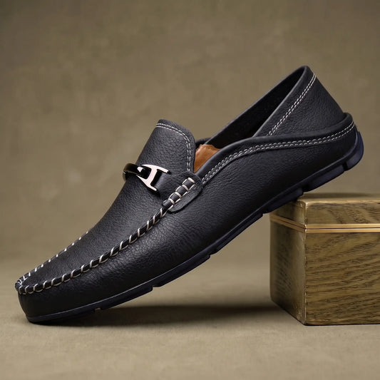 Black pebbled leather slip on driving loafer for men with silver metal bar and ivory contrast stitching