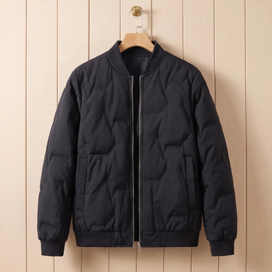Ridgeline quilted bomber in black on a wooden hanger