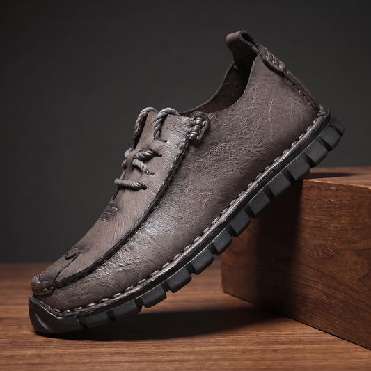 Grey pebble grain leather moccasin with rope lace and lugged sole