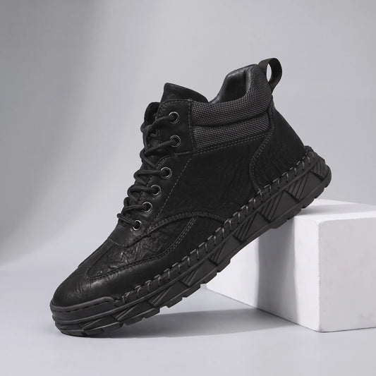 RUGGED LACE BOOTS in black, men's mid-top lace-up boot with a mesh collar and hand-stitched lug sole