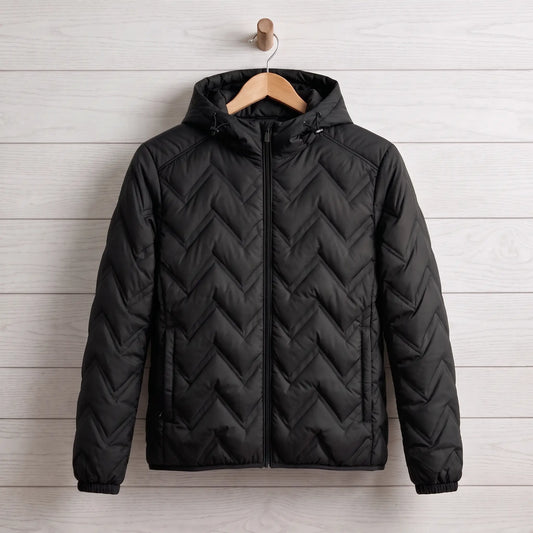 Skyline quilted jacket in black on a wooden hanger