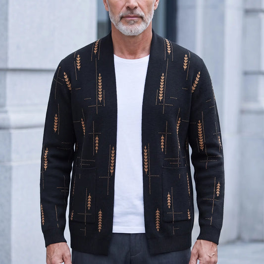 Man wearing the Wheat Knit Cardigan in black, an open-front knit cardigan with a tan wheat pattern, over a white tee