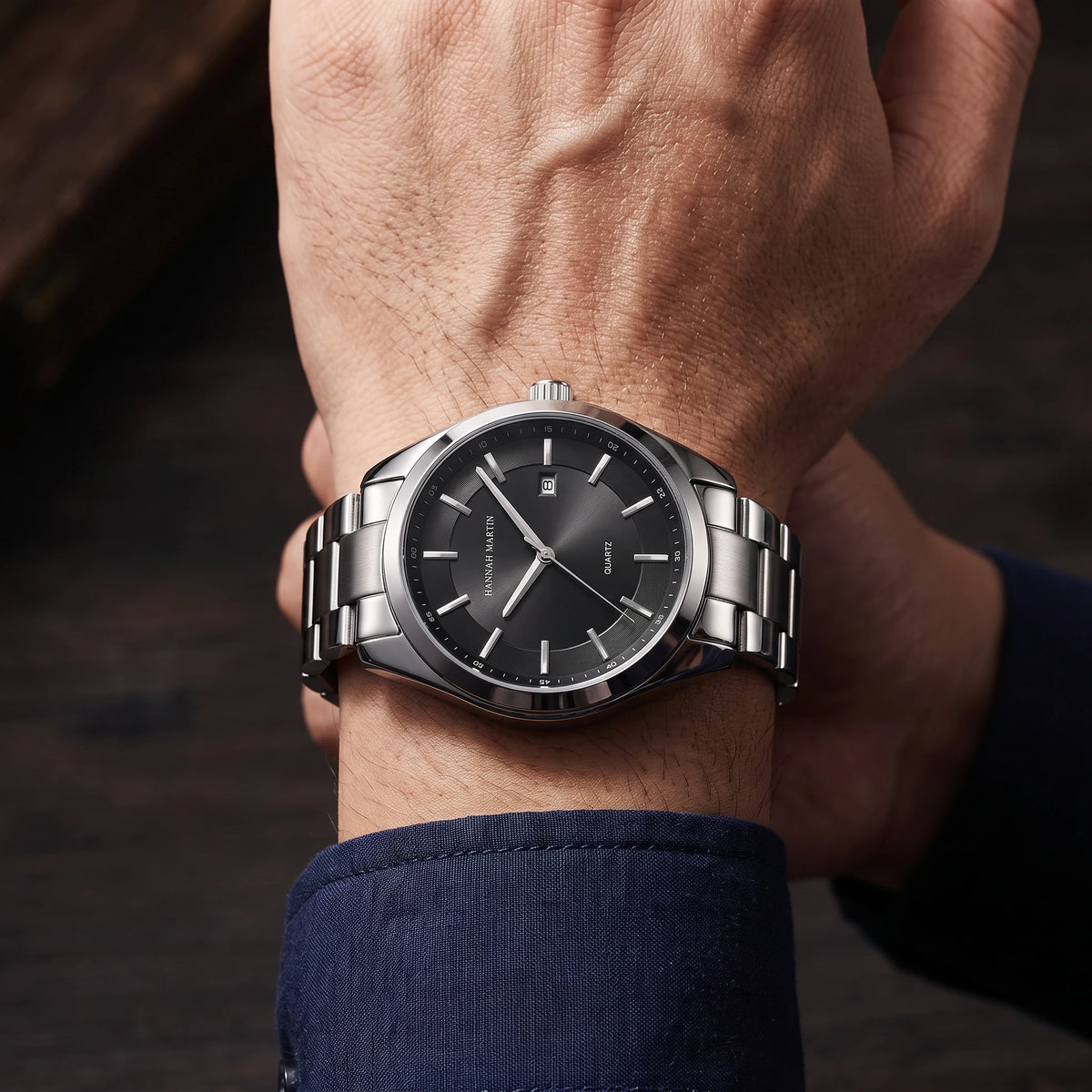 Classic sleek quartz watch worn on a raised wrist, lifestyle