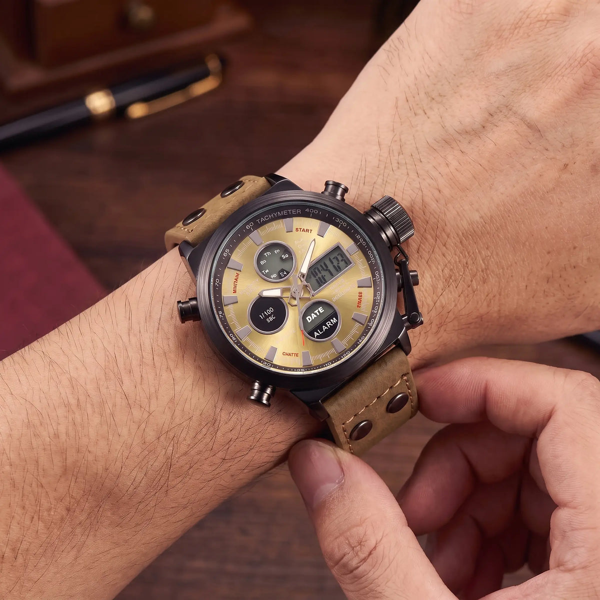 Man fastening the khaki Dual Display Watch onto his wrist