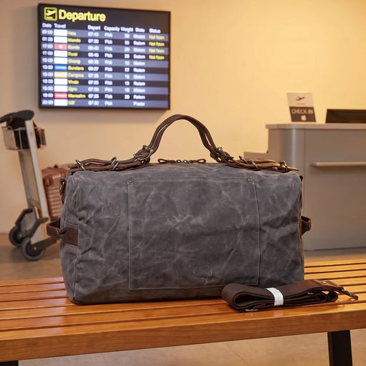 Waxed canvas military duffel bag in dark grey