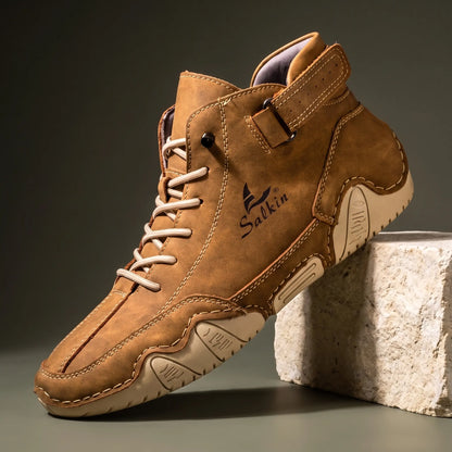 Men's tan brown suede high top ankle boot sneaker with padded collar and cream wave sole