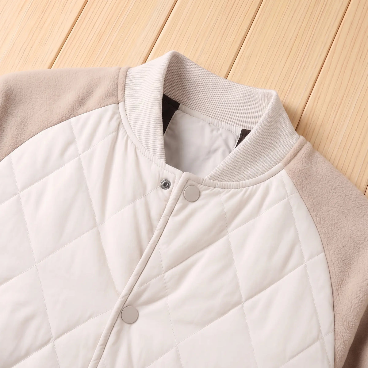 Ribbed collar and snap placket detail