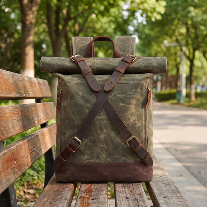 Rugged waxed canvas roll top backpack in green