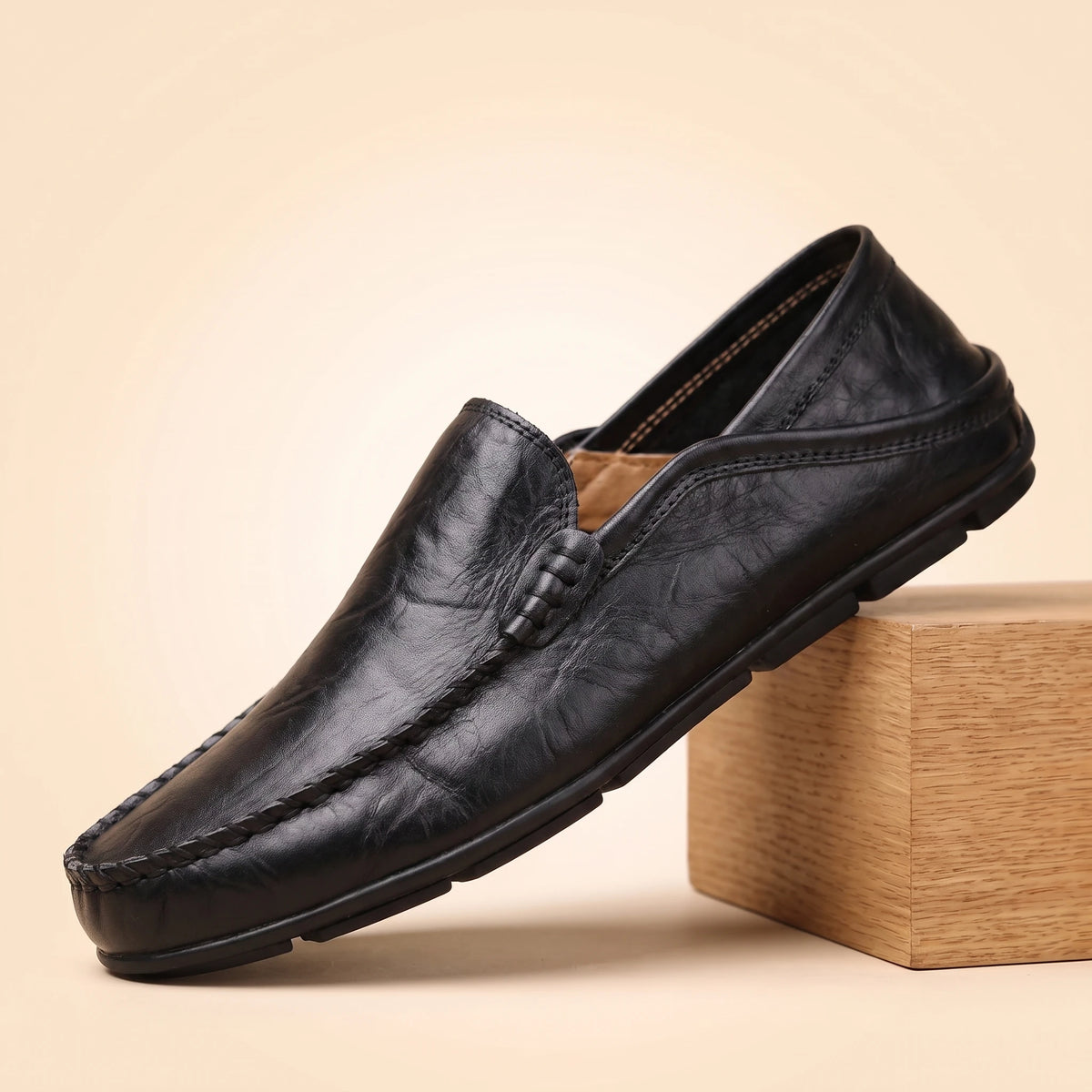 Black leather slip-on moccasin loafer