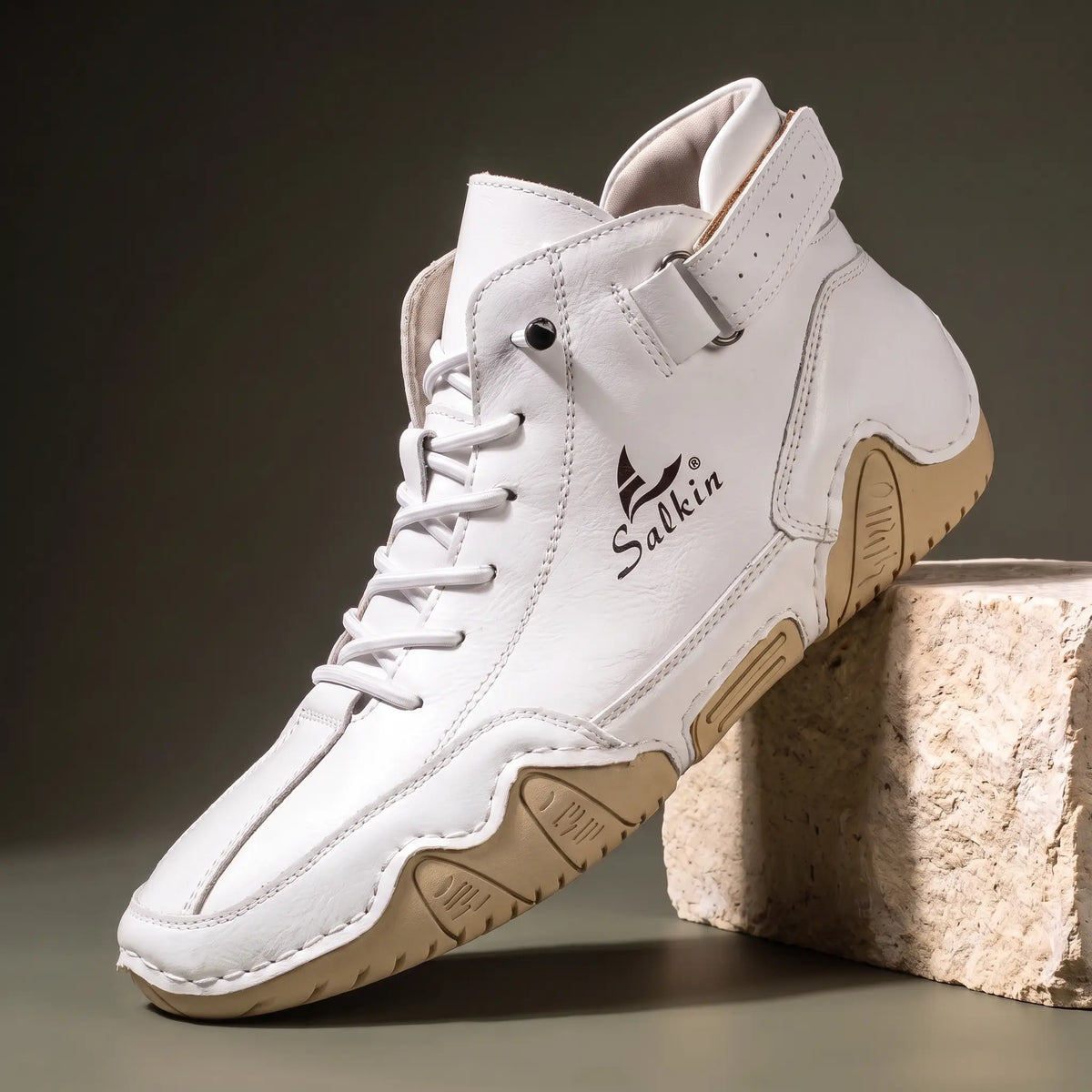 Men's white leather high top ankle boot sneaker with padded collar and cream wave sole