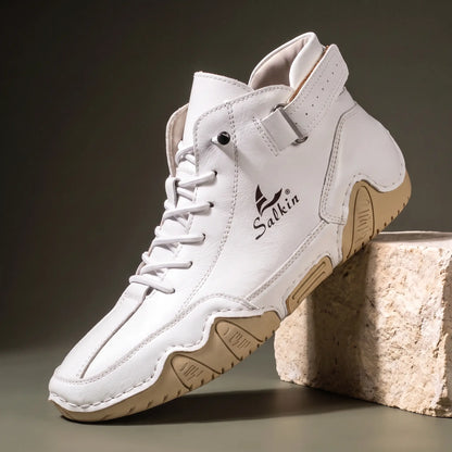 Men's white leather high top ankle boot sneaker with padded collar and cream wave sole