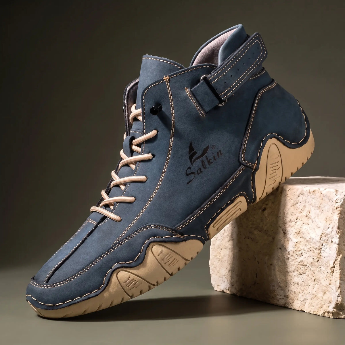 Men's navy blue suede high top ankle boot sneaker with padded collar and cream wave sole