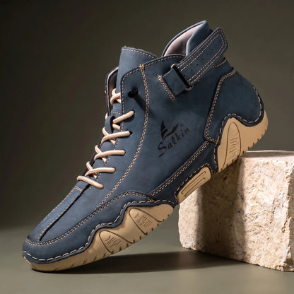 Men's navy blue suede high top ankle boot sneaker with padded collar and cream wave sole