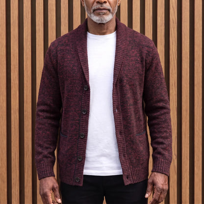 Men's deep red flecked knit shawl collar cardigan worn open over a white tee