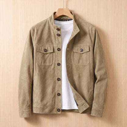 REFINED CHORE JACKET khaki suede button-front shirt-jacket with two chest flap pockets on a wooden hanger against a light bright wood wall