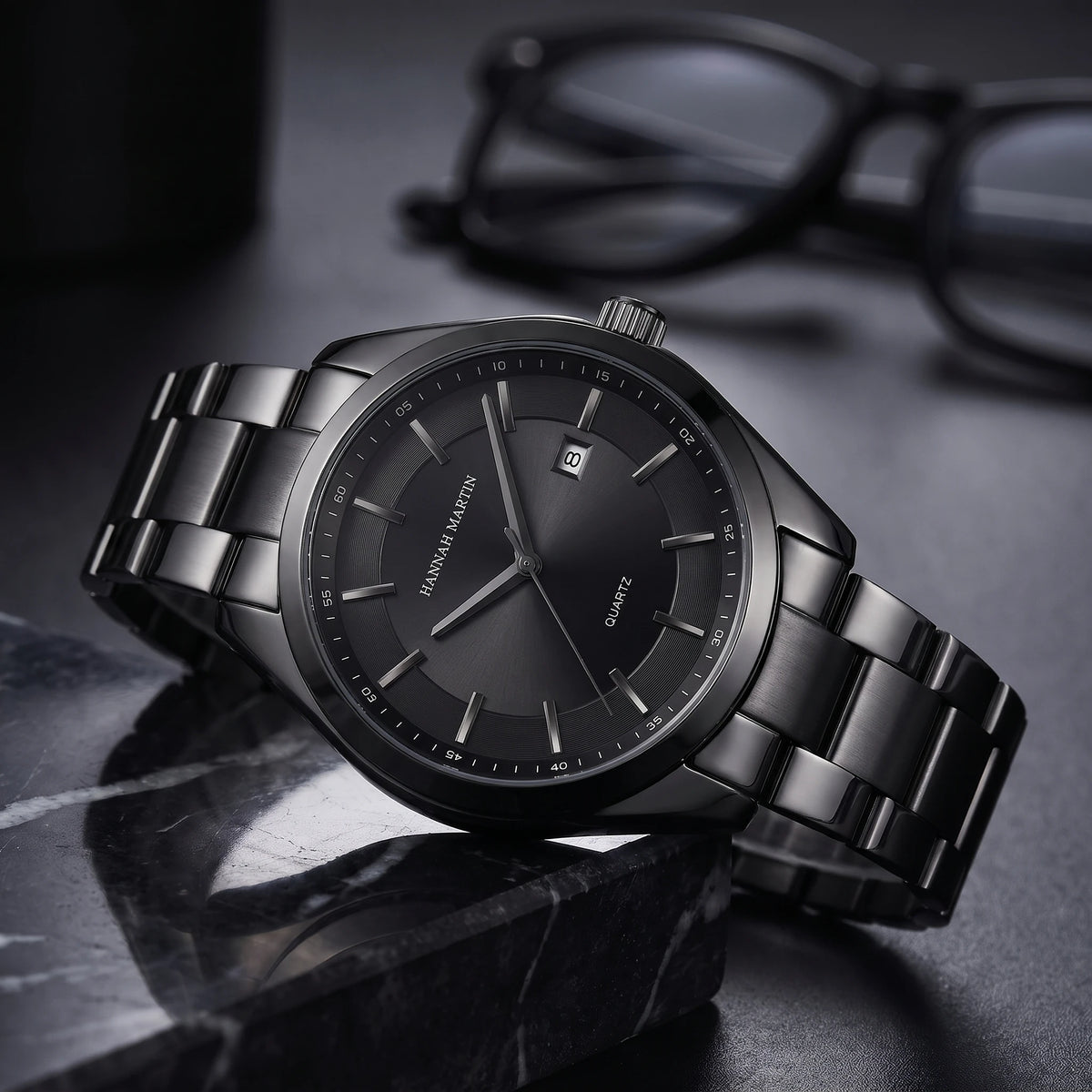 Black quartz watch with dark case and black dial