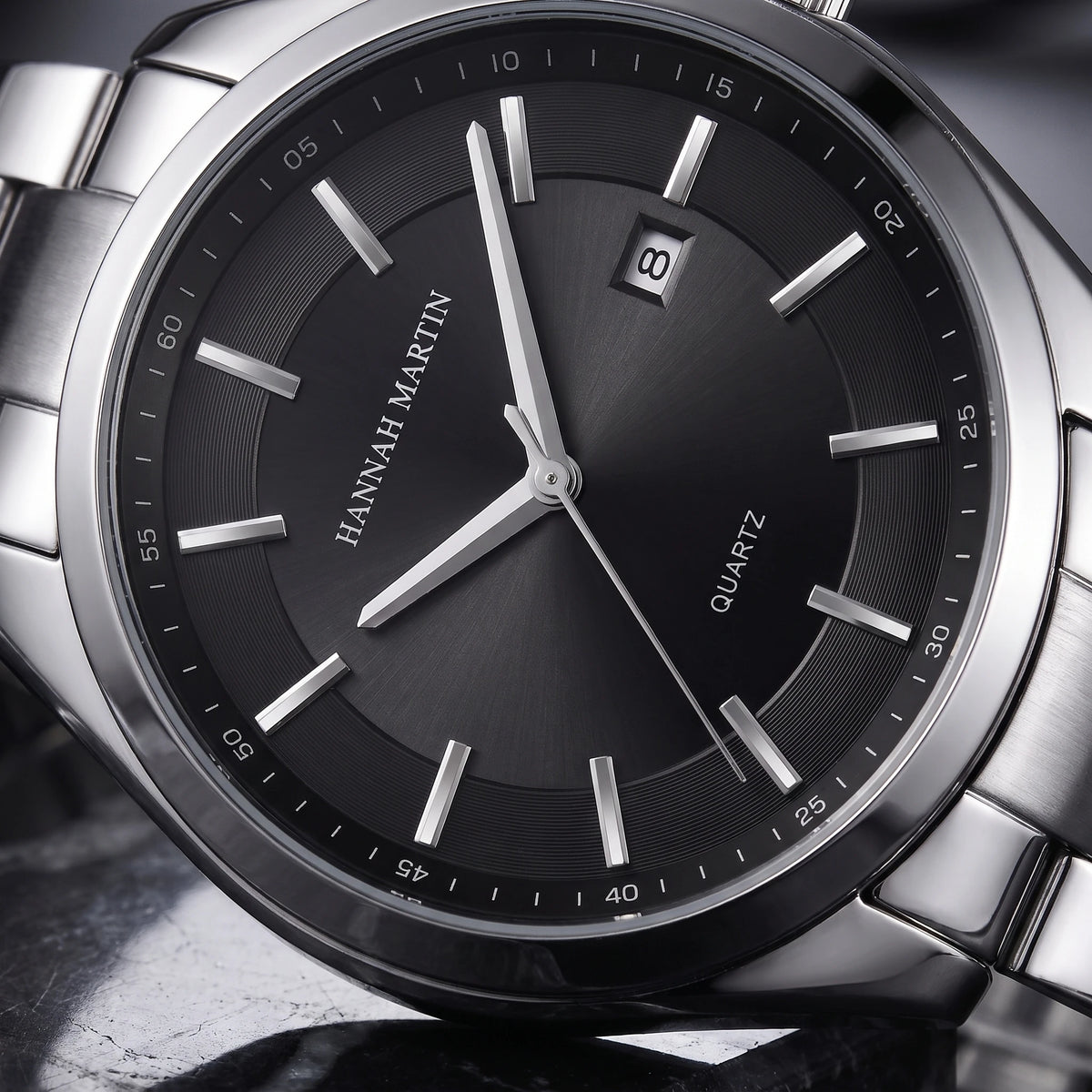 Close-up detail of the quartz watch dial and hands