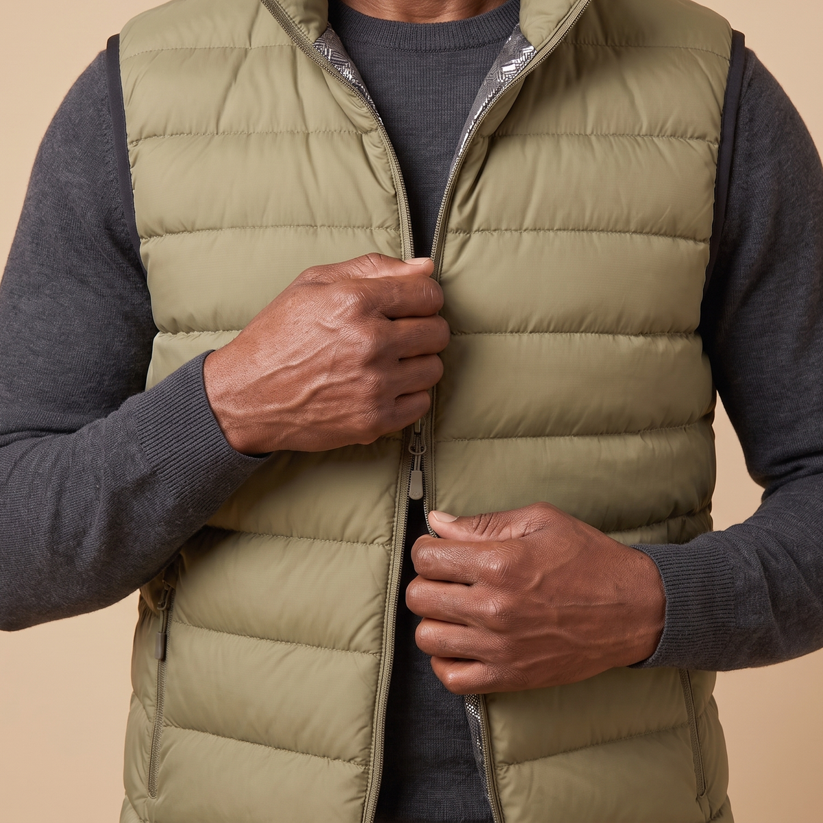 PACKABLE DOWN VEST worn zipping up