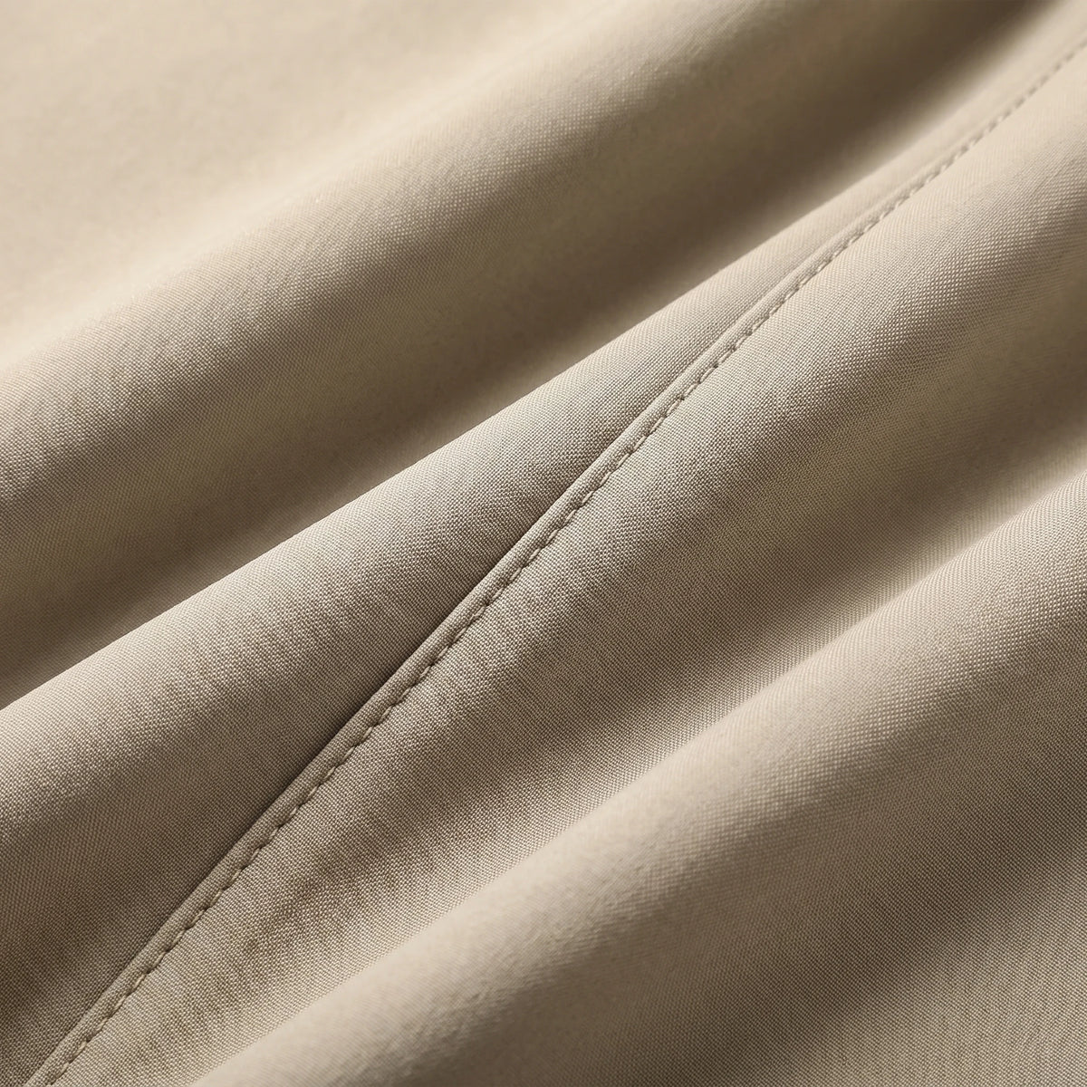 Stretch cargo trousers fabric texture close-up