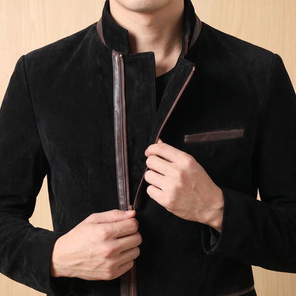 Man wearing black Angled Zip Jacket zipping up the front