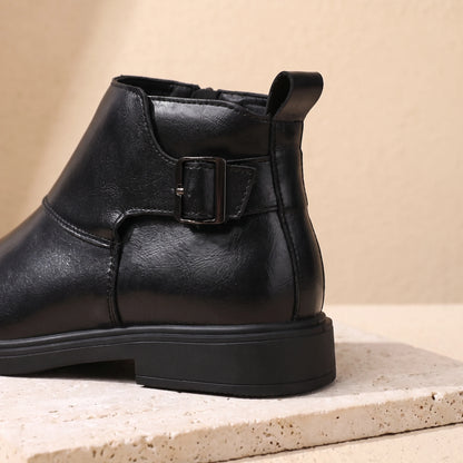 Close-up of black Chelsea boot heel and back