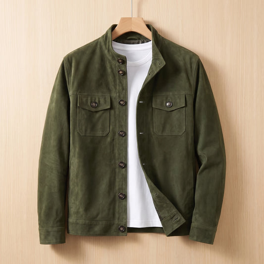 REFINED CHORE JACKET army green suede button-front shirt-jacket with two chest flap pockets on a wooden hanger against a light bright wood wall