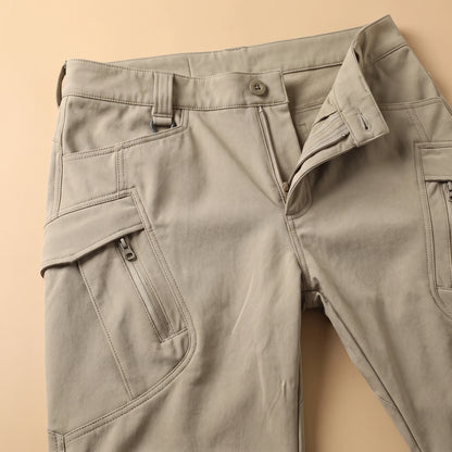Stretch cargo trousers waistband and cargo pocket detail close-up