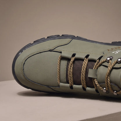 Close detail of BRAIDED CORD BOOTS showing the braided cord lacing and metal eyelets