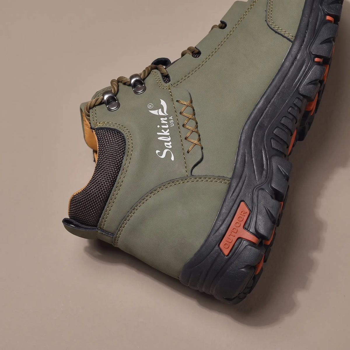 Close detail of BRAIDED CORD BOOTS showing the padded ankle collar and lug outsole