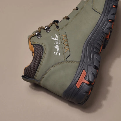 Close detail of BRAIDED CORD BOOTS showing the padded ankle collar and lug outsole