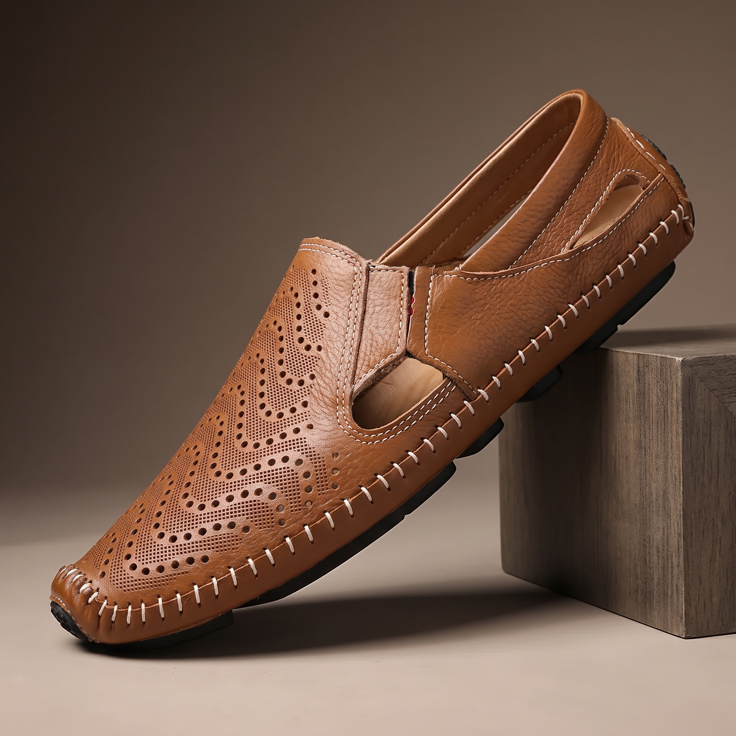 Breathable Summer Loafers in brown - single perforated leather driving loafer on a smoked-oak set