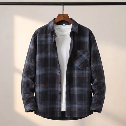 BRUSHED FLANNEL SHIRT in Black - navy shadow plaid flannel shirt with rust pinstripes, point collar and chest pocket on a wooden hanger