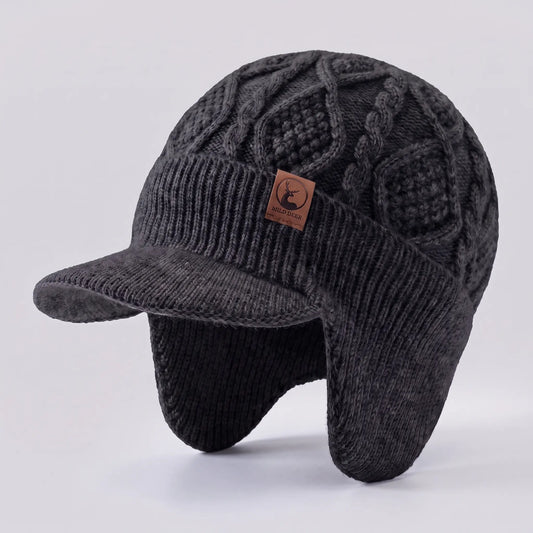 Men's black cable-knit peaked earflap beanie with leather patch