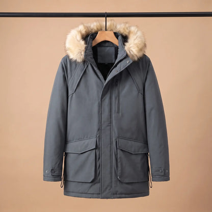 Grey cargo pocket parka for men with fur trimmed hood on a wooden hanger