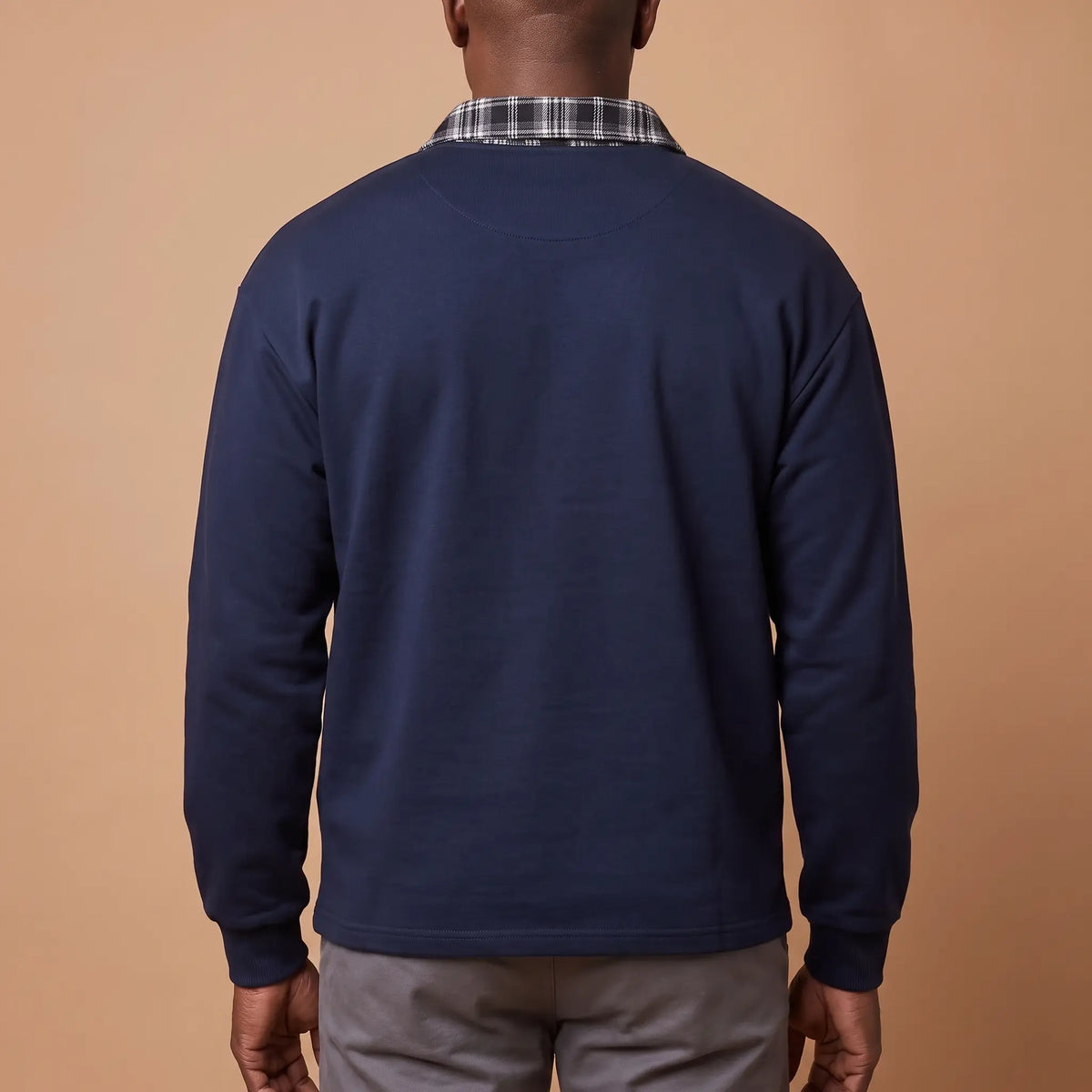 Back view of a navy blue check collar half-zip sweatshirt for men, showing the check collar at the back