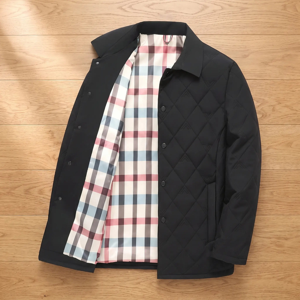 CHECK LINED JACKET laid open showing the cream check lining, black