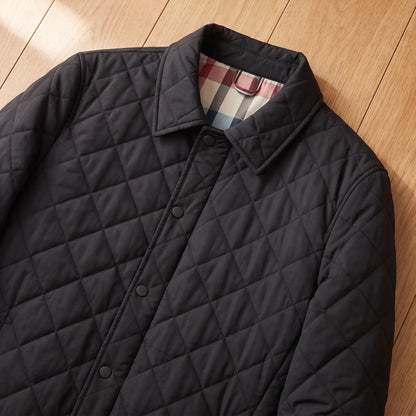 CHECK LINED JACKET close-up of the shirt collar and snap placket, black