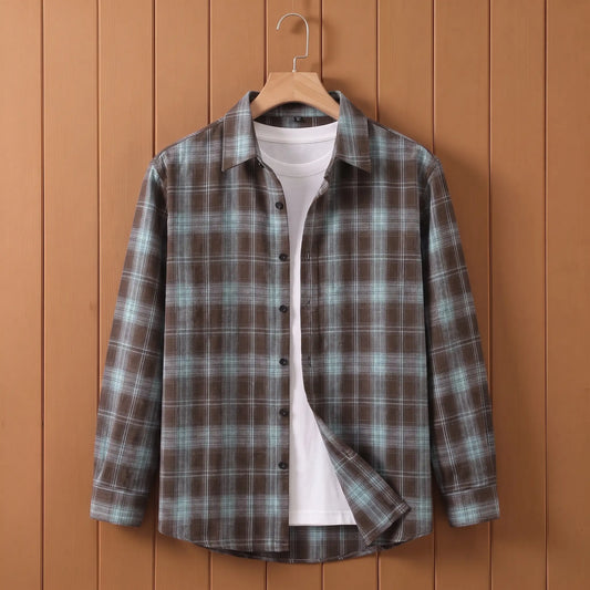 Men's blue plaid long-sleeve button shirt open over a white tee on a wooden hanger