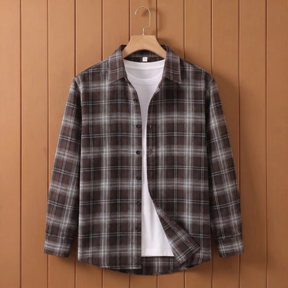 Men's brown plaid long-sleeve button shirt open over a white tee on a wooden hanger