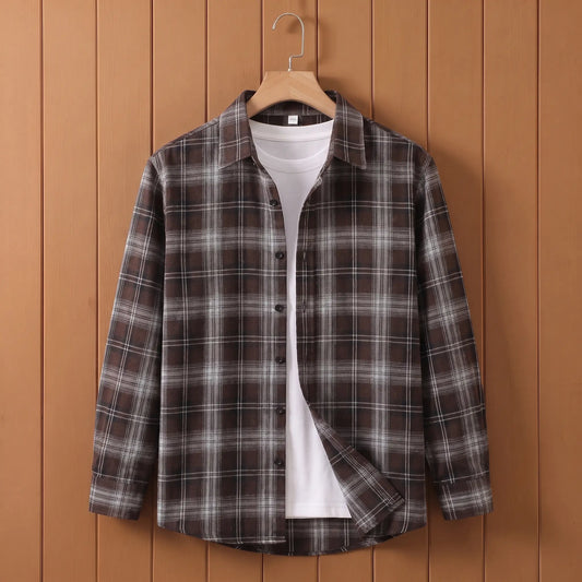 Men's brown plaid long-sleeve button shirt open over a white tee on a wooden hanger