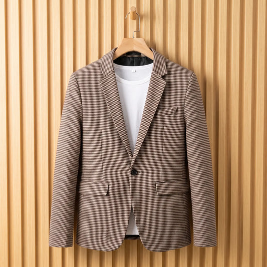 Men's brown houndstooth single-button blazer over a white tee on a wooden hanger