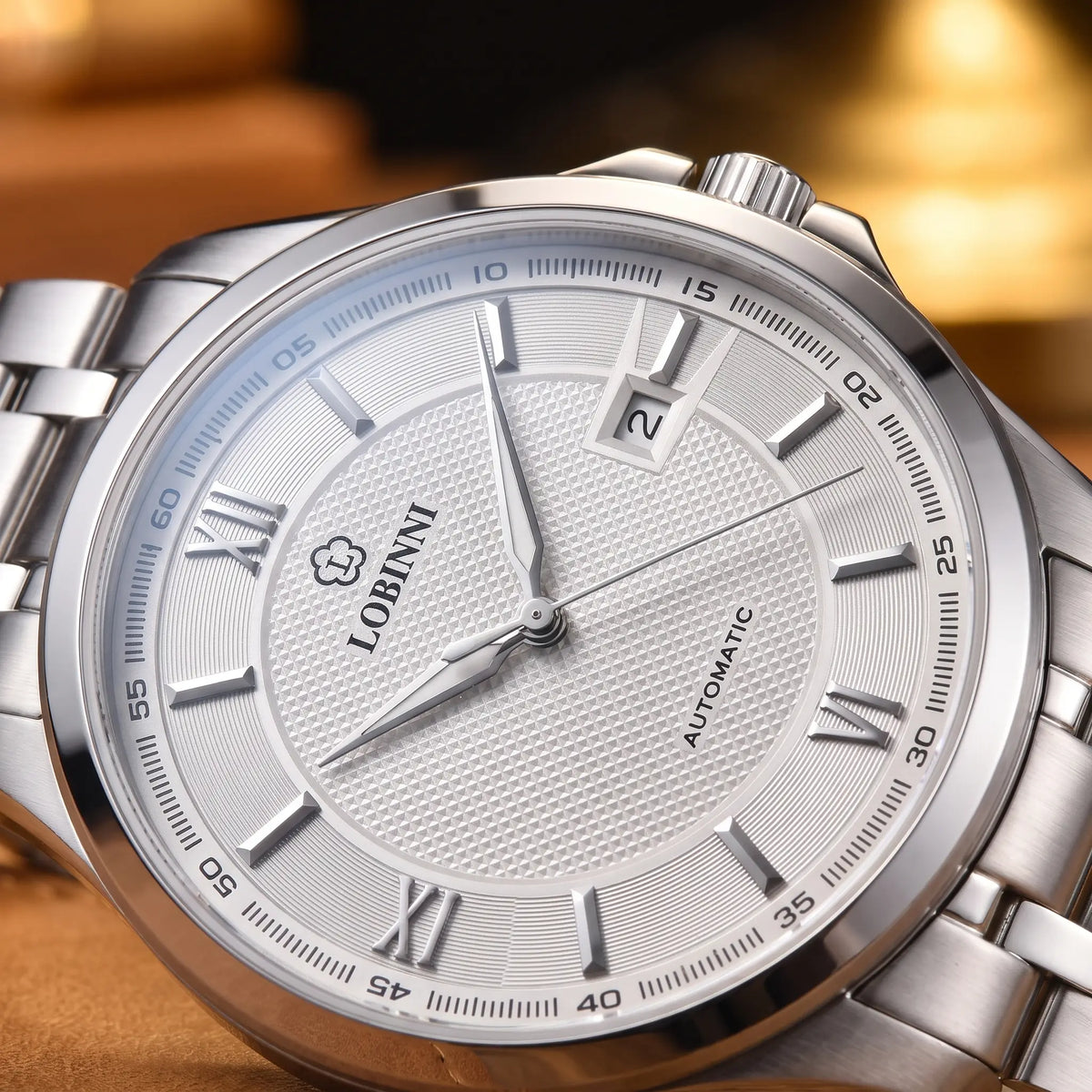 CLASSIC STEEL AUTOMATIC White Silver dial close-up - textured dial, Roman numerals and date window