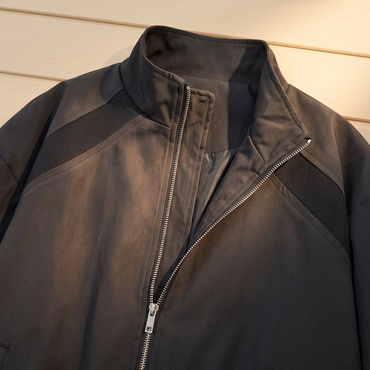 CLASSIC ZIP BOMBER close-up of stand collar and zip in black