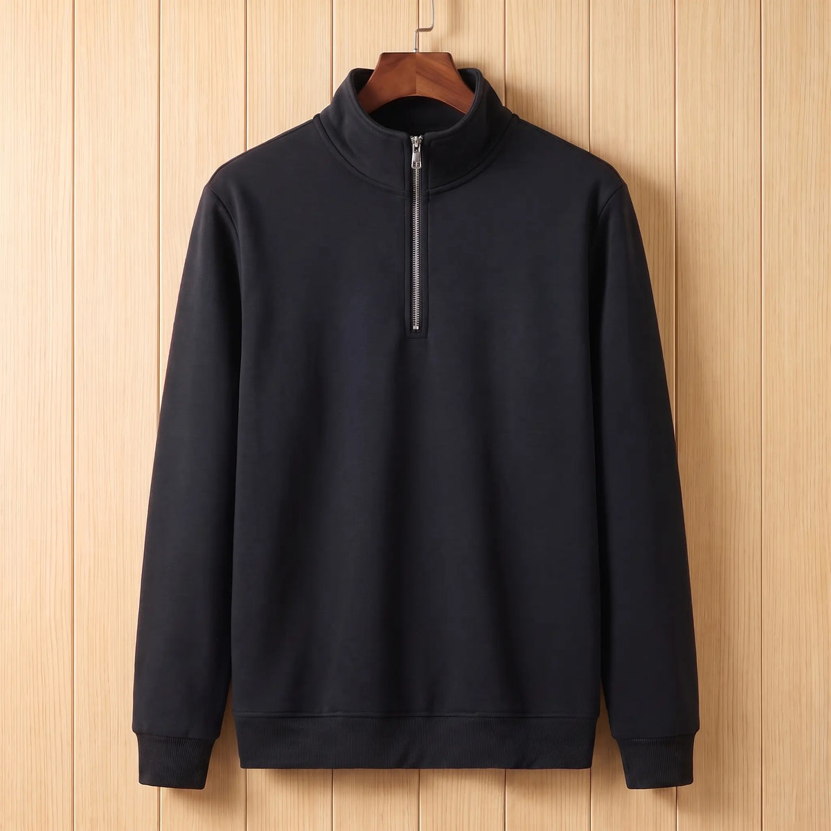 Men's black half-zip stand collar sweatshirt on a wooden hanger